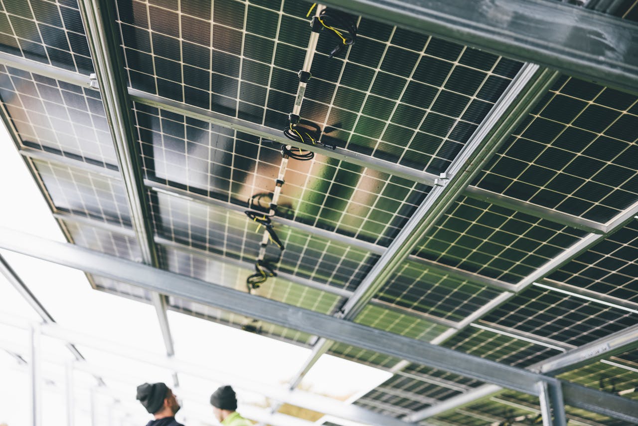 Mastering the First Impression: Your intriguing post title goes here Close-up of solar panels being installed outdoors with technicians visible.